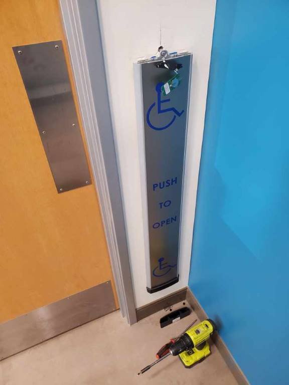 ADA automatic door opener installed on a commercial entrance